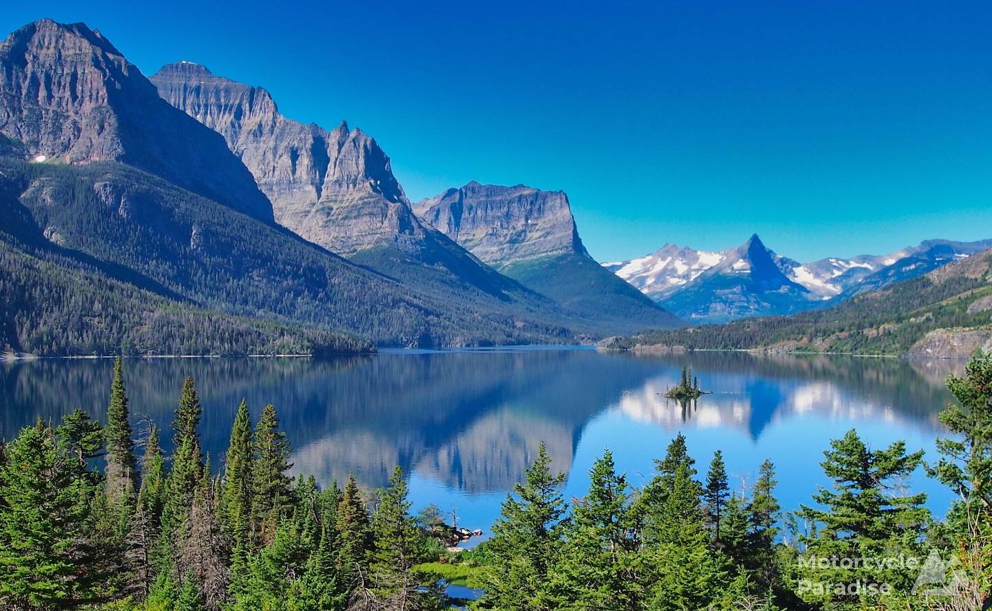 Despite not smiling I was blown away by the amazing scenery on my 2012 North American ride. Can’t believe I toured in a leather jacket. 😅 #goingtothesunroad #glaciernationalpark #montana #motorcycletouring #motorcycletrip #motorcycletravel #motorcycleadventure #mototouring #soloride #adventurerider